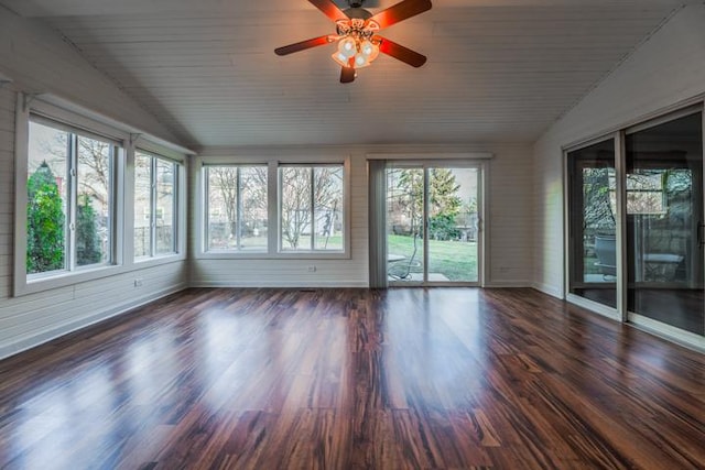 unfurnished sunroom with ceiling fan, lofted ceiling, and plenty of natural light