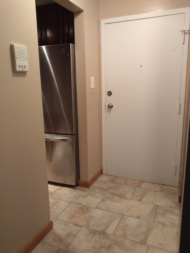 kitchen with stainless steel refrigerator