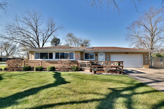 ranch-style home with a garage, a wooden deck, and a front lawn