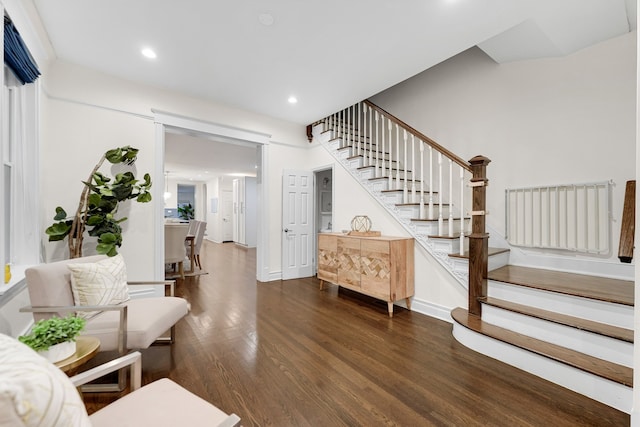 interior space with dark hardwood / wood-style floors