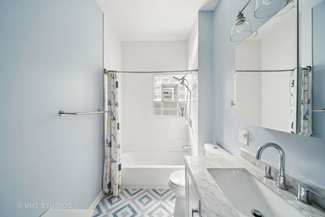 full bathroom featuring shower / tub combo, vanity, and toilet