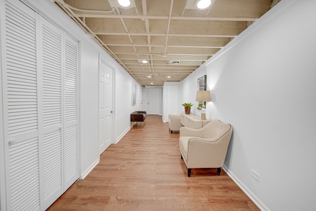 hallway featuring light hardwood / wood-style flooring