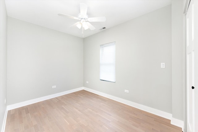 unfurnished room with ceiling fan and light hardwood / wood-style flooring