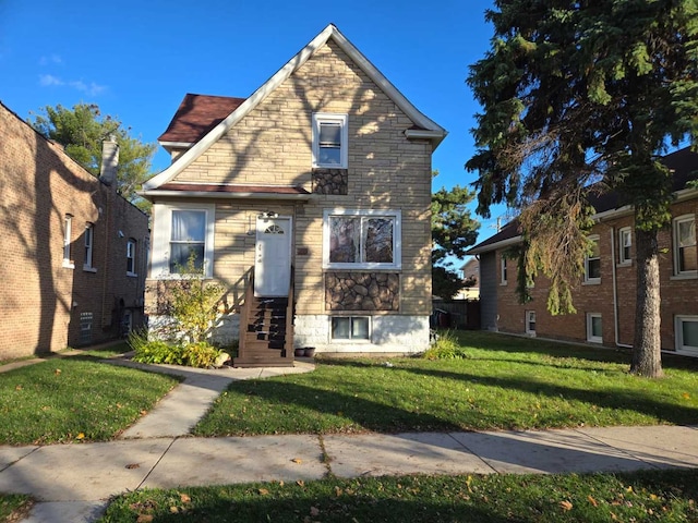 view of front of home with a front yard