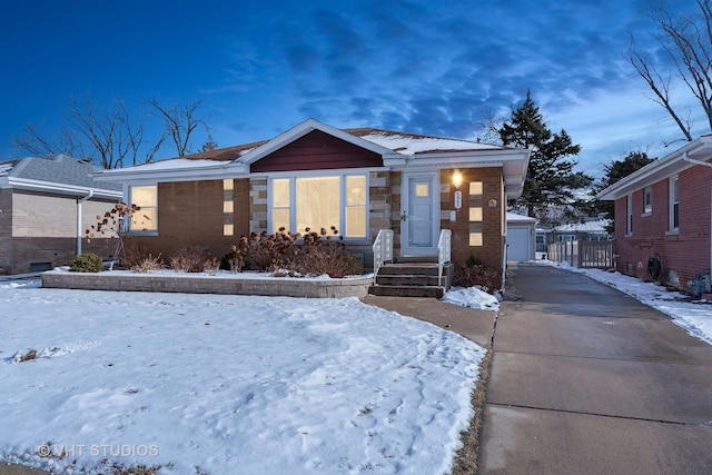 view of front of property with a garage