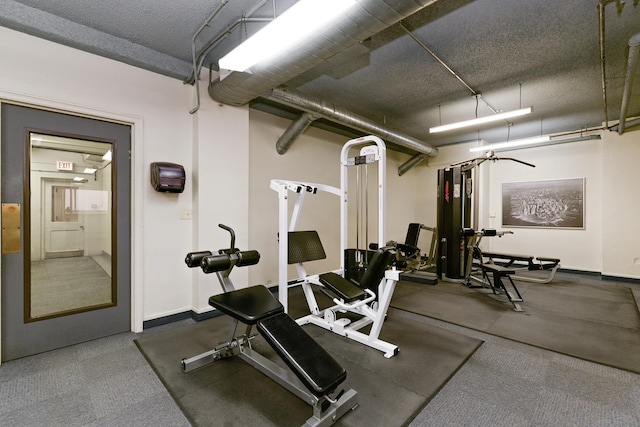 workout area with baseboards