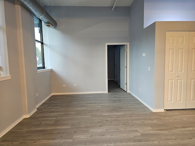 empty room featuring hardwood / wood-style flooring