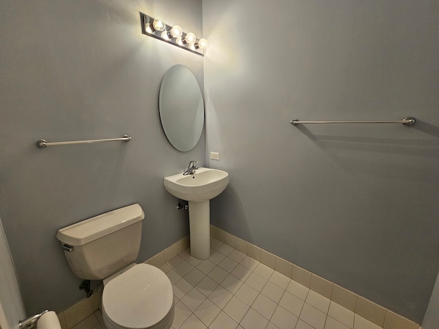 bathroom with tile patterned floors and toilet