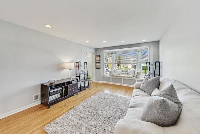 living room with wood-type flooring