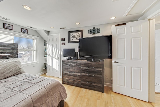 bedroom featuring light hardwood / wood-style floors