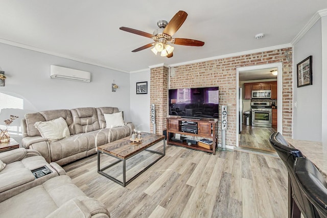 living room with an AC wall unit, light hardwood / wood-style flooring, ceiling fan, ornamental molding, and brick wall