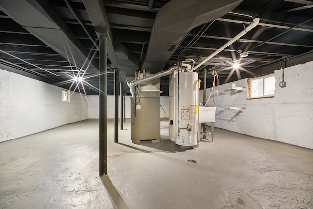 basement with heating unit and water heater