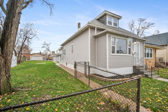 view of home's exterior featuring a lawn