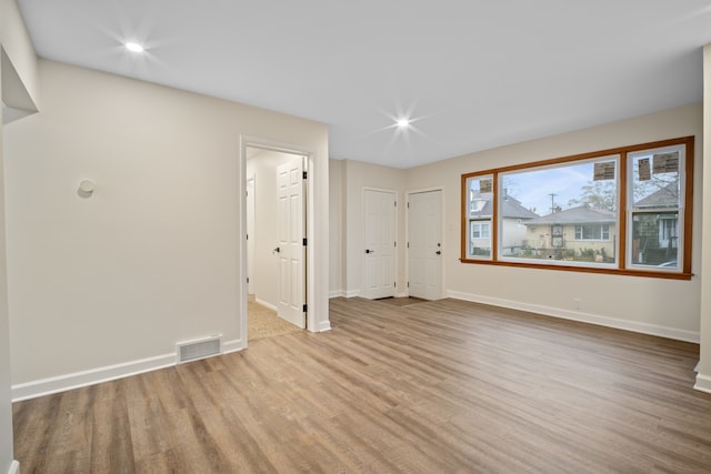 empty room featuring light hardwood / wood-style floors