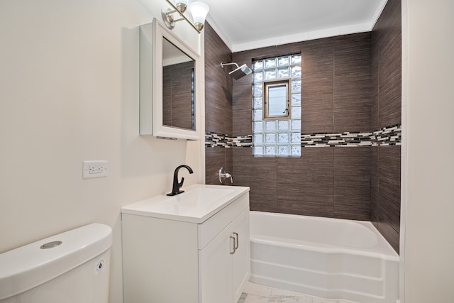 full bathroom with vanity, toilet, and tiled shower / bath