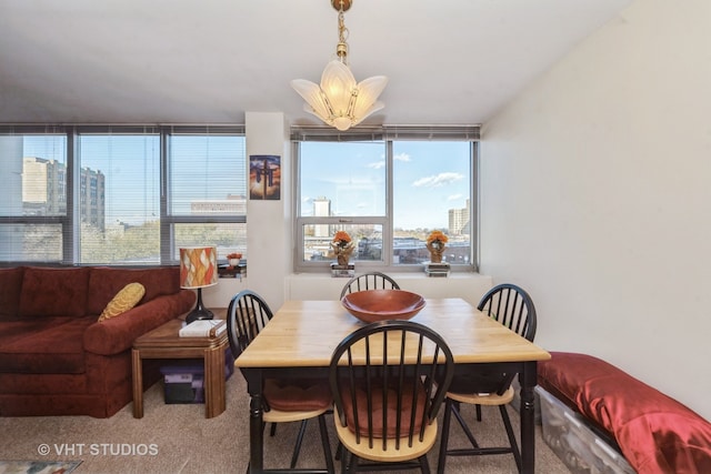 dining area with carpet flooring