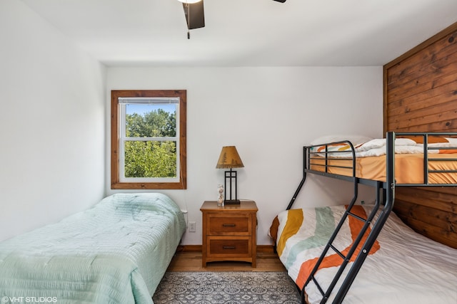 bedroom with ceiling fan and light hardwood / wood-style flooring