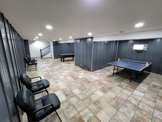 game room featuring wooden walls and pool table