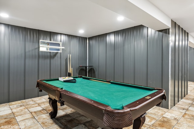 rec room featuring wood walls and billiards