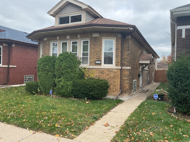 view of front facade with a front lawn