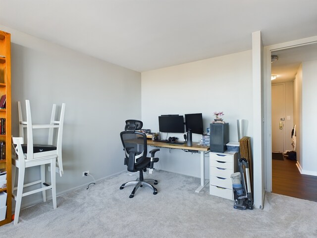 655 W Irving Park Rd Unit 1710, Chicago, IL 60613 - carpeted home office featuring baseboards
