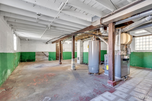 basement featuring gas water heater