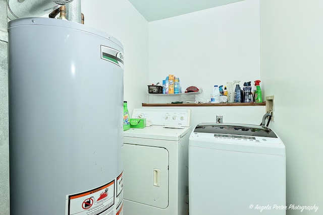 laundry area featuring washer and clothes dryer and water heater