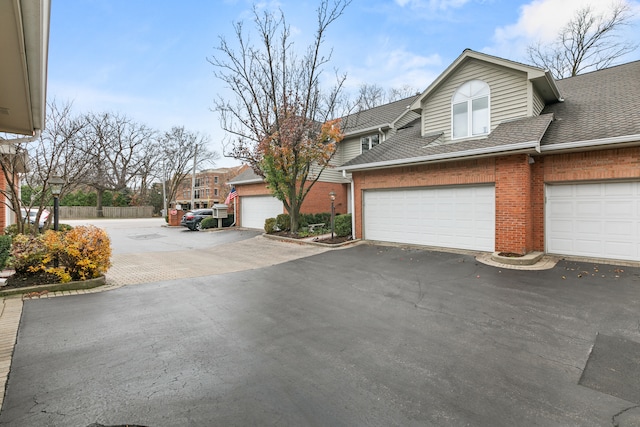 exterior space with a garage