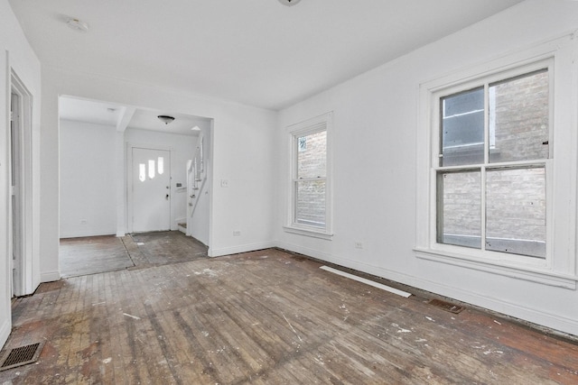 foyer with wood-type flooring