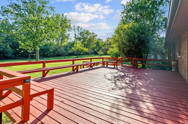 deck featuring a yard