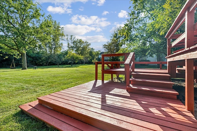 deck featuring a yard