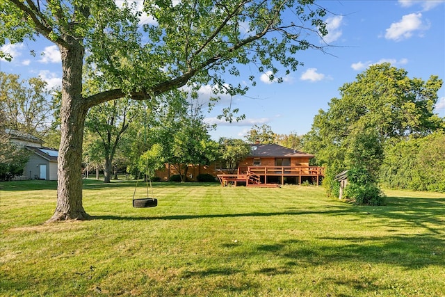 view of yard with a deck