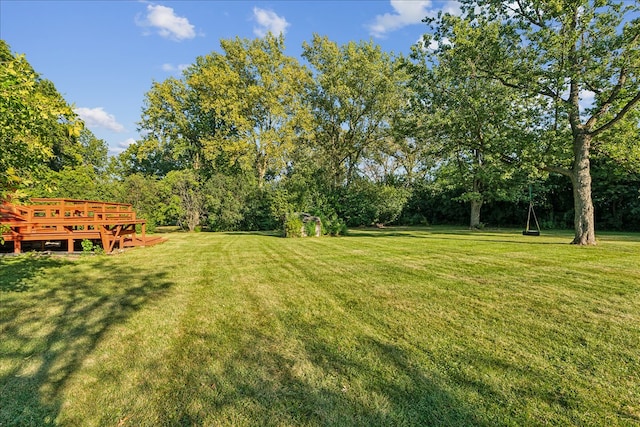 view of yard featuring a deck