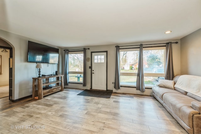 unfurnished living room featuring light hardwood / wood-style flooring