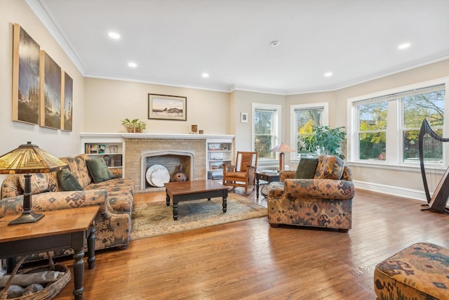 living room featuring wood-type flooring and ornamental molding