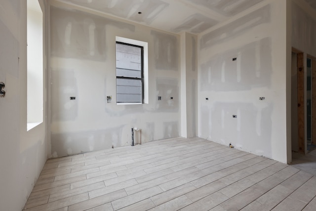 spare room featuring light hardwood / wood-style floors