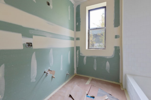 bathroom with a washtub