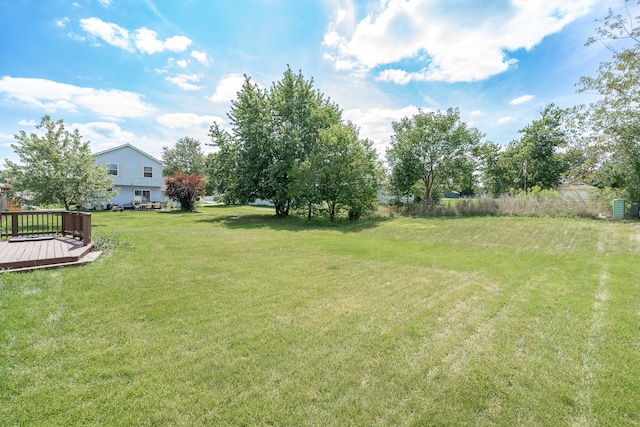 view of yard with a deck