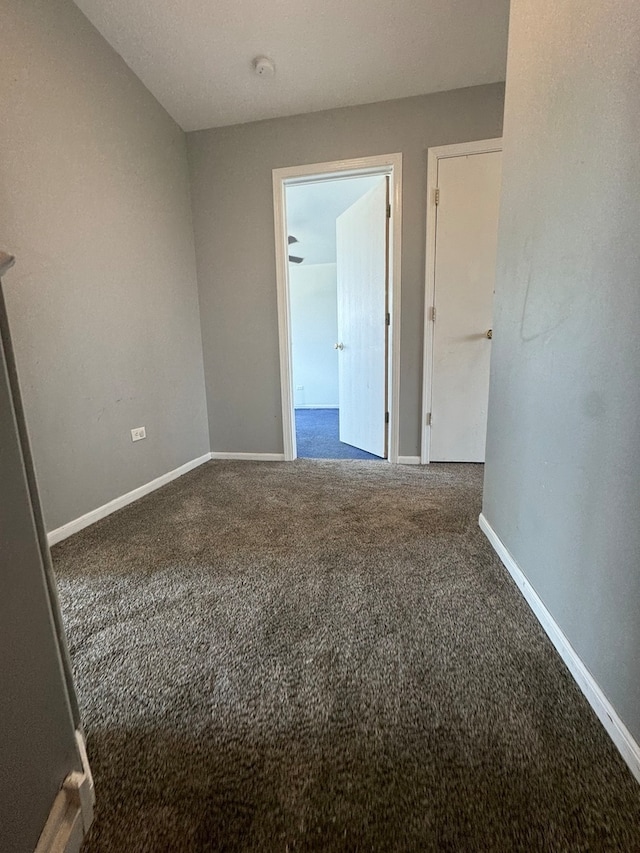 empty room featuring carpet floors