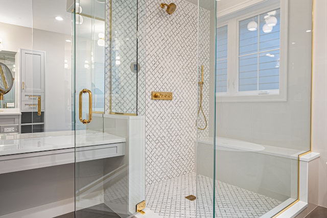 bathroom featuring tile patterned flooring and an enclosed shower