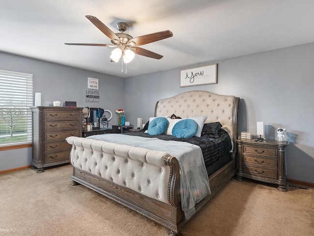 bedroom featuring ceiling fan and light colored carpet