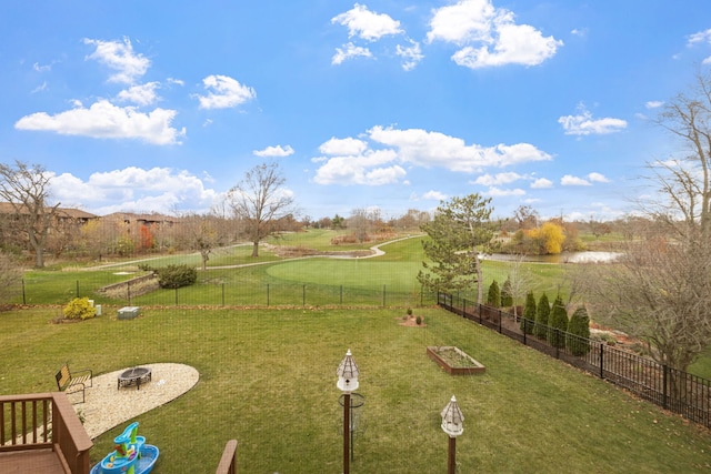 view of yard with a fire pit