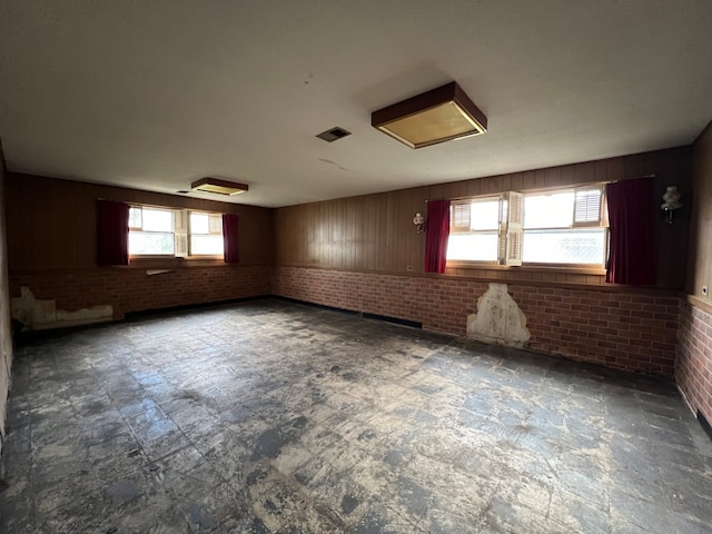 empty room with brick wall