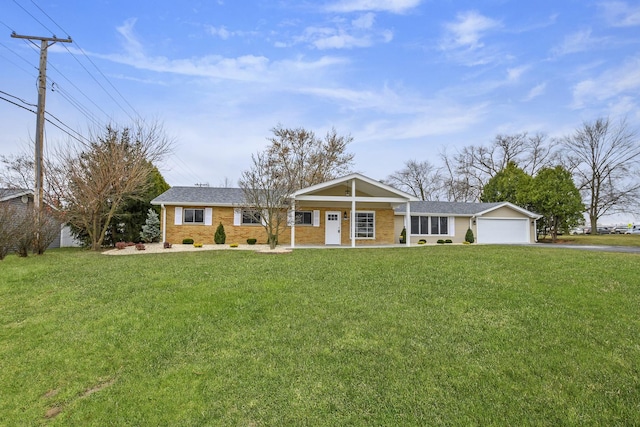 ranch-style house with a porch, a garage, and a front lawn