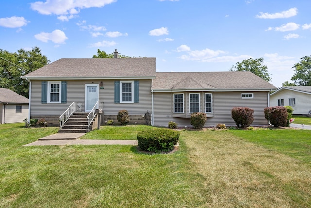 ranch-style home with a front lawn