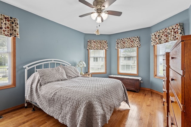 bedroom featuring ceiling fan and light wood-type flooring