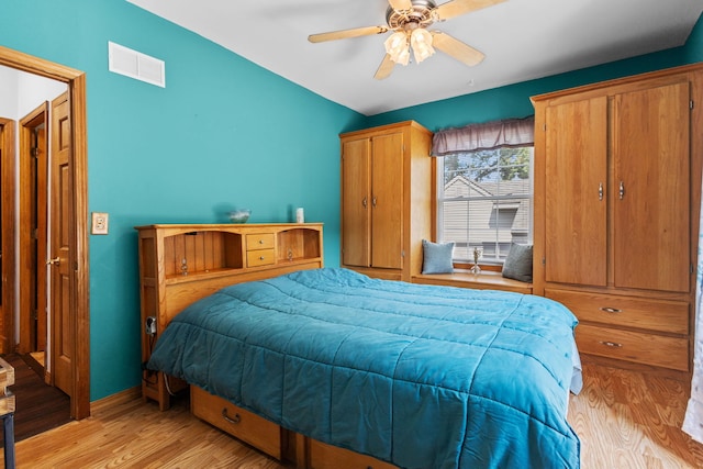 bedroom featuring light wood-type flooring and ceiling fan