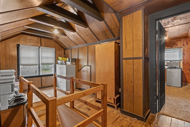 unfinished attic with a healthy amount of sunlight