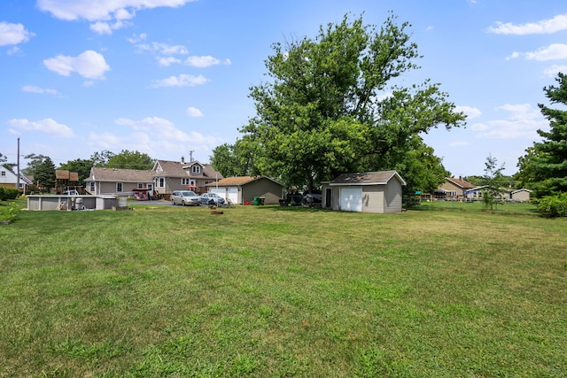 view of yard with a storage shed