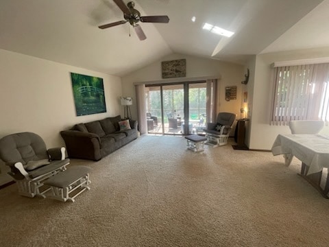 carpeted living room featuring ceiling fan, french doors, and lofted ceiling